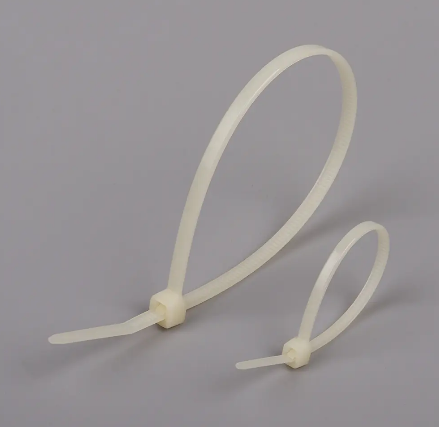 We offer cable ties made of durable polyamide 4.6 (PA46) material. Designed to withstand temperatures up to +195 °C for 500 hours, these ties are ideal for applications requiring a wider temperature range. Polyamide 4.6 is a popular choice in industries such as automotive, rail and white goods.